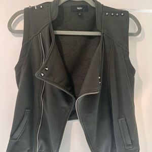 Green vest with stud detail